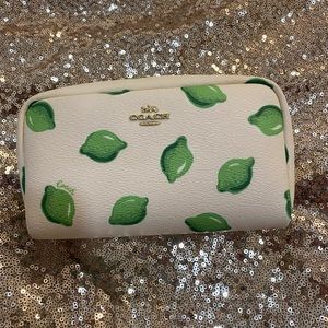 COACH - Lime print cosmetic makeup case.